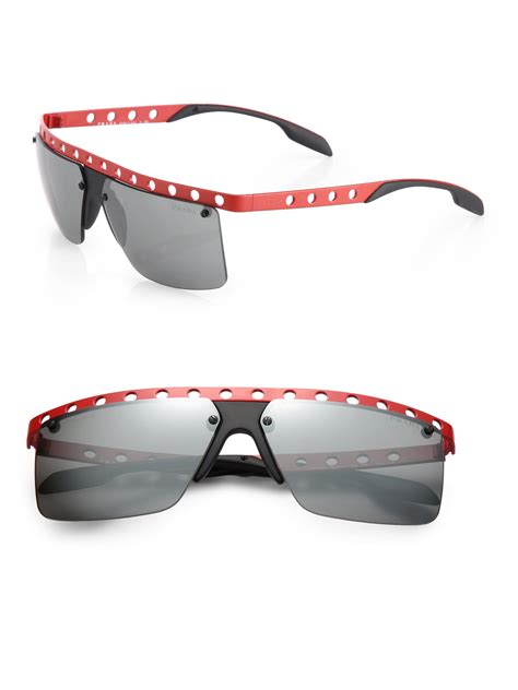 red rimless sunglasses.